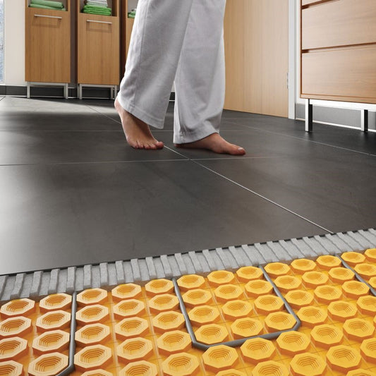 From Chilly to Chillin’ : Why Heated Floors Are a Must-Have in Your Bathroom Remodel